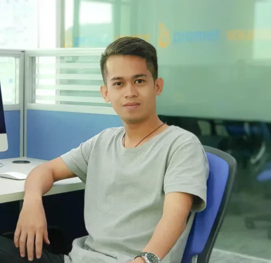 Jhon Robert at a desk